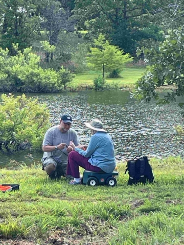 Field Day Elmer helping with fish